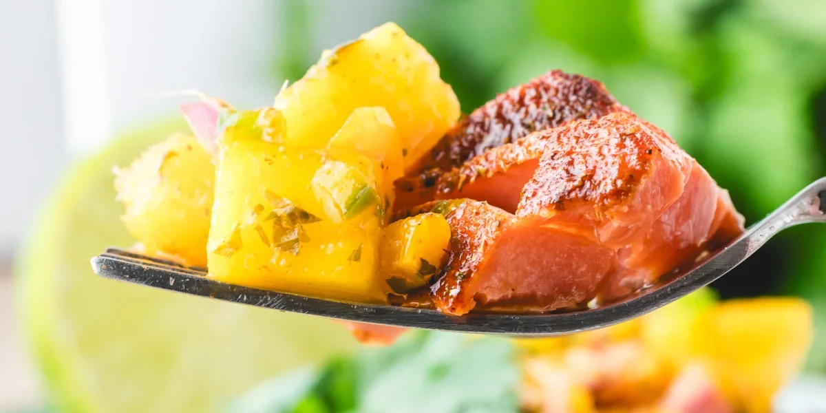 Easy weeknight dinner of blackened Cajun salmon and mango salsa
