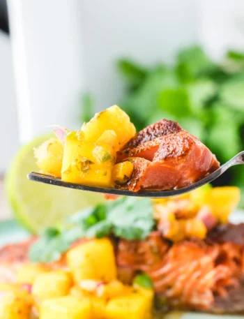 Easy weeknight dinner of blackened Cajun salmon and mango salsa