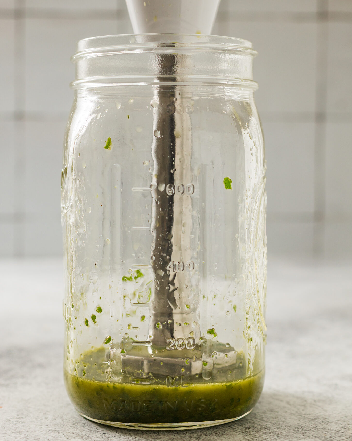 Blended Basil and Olive Oil for Caprese Salad with Cherry Tomotoes