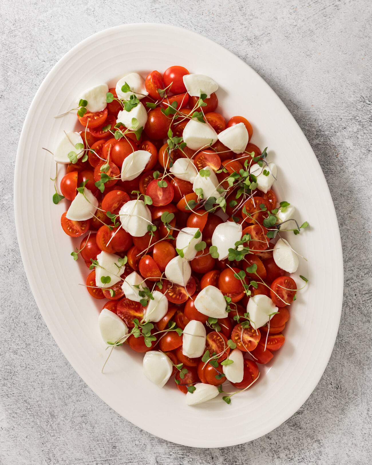 Cherry tomatoes, mozzarella, microgreens